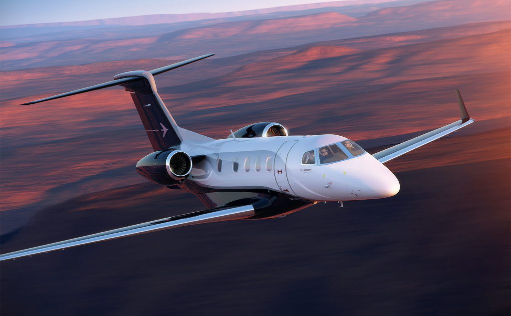 small private plane flying through the mountains